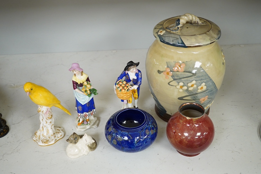 A Royal Lancastrian vase and a Dupuy vase and a Sally Shrimpton studio floral pottery jar and cover, a small group of mixed ceramics to include a Royal Worcester model of a canary, No 2665, a Royal Doulton ‘cat’ group an